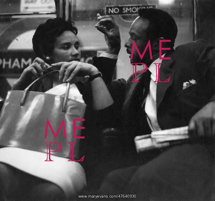 : Couple on a London underground train : Couple on a London underground train