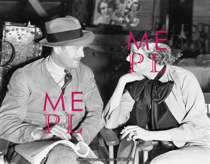 : Couple looking at each other flirting and smiling : Couple looking at each other flirting and smiling