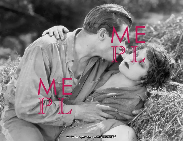: Couple lying together in hay : Couple lying together in hay