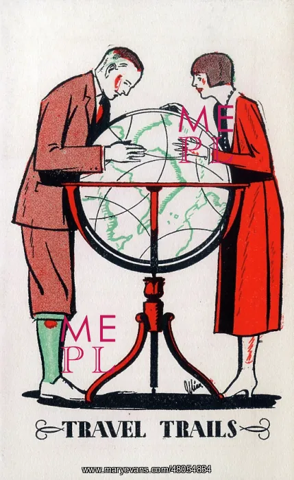 : A couple plan their dream travel trip using a large globe : A couple plan their dream travel trip using a large globe