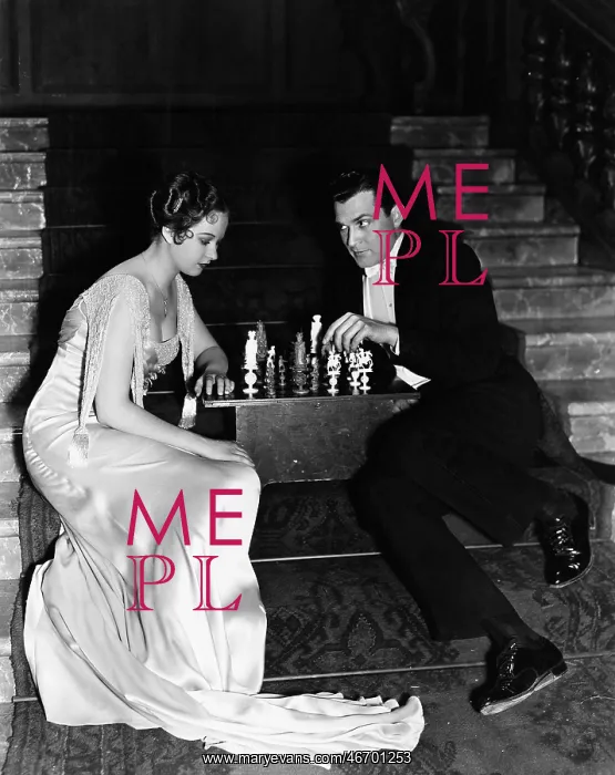 : Couple playing chess : Couple playing chess