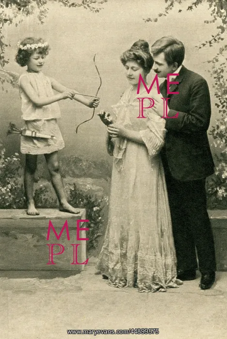 : Couple pose by cupid ?statue? : Couple pose by cupid ?statue?