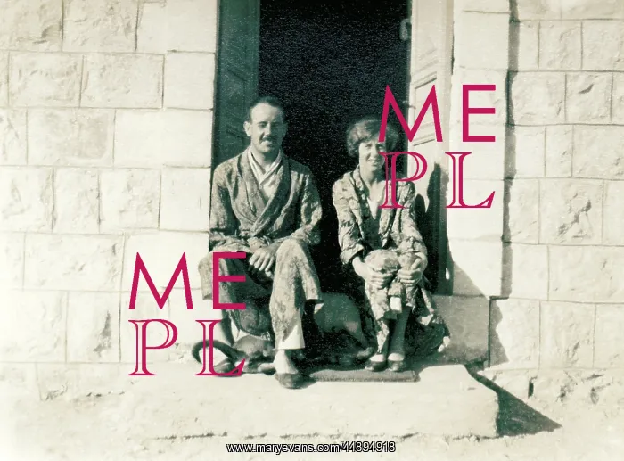 : Couple in pyjamas sitting on a stone step in the sun : Couple in pyjamas sitting on a stone step in the sun