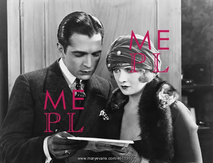  : Couple reading document together