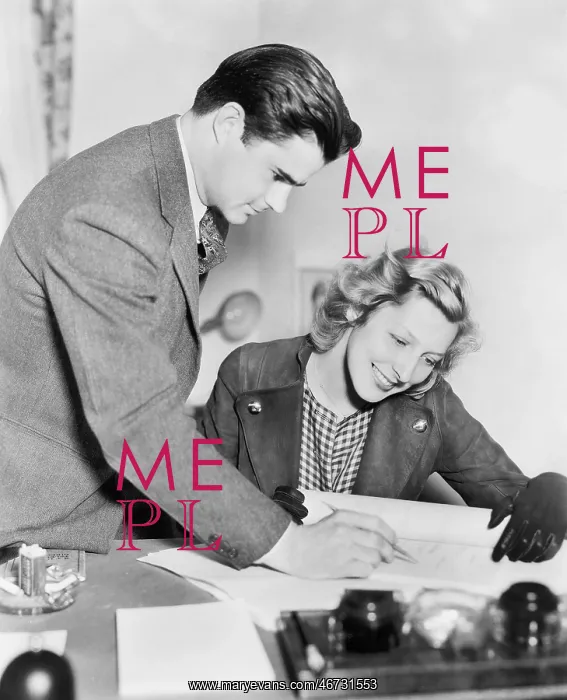 : Couple reading a document together : Couple reading a document together