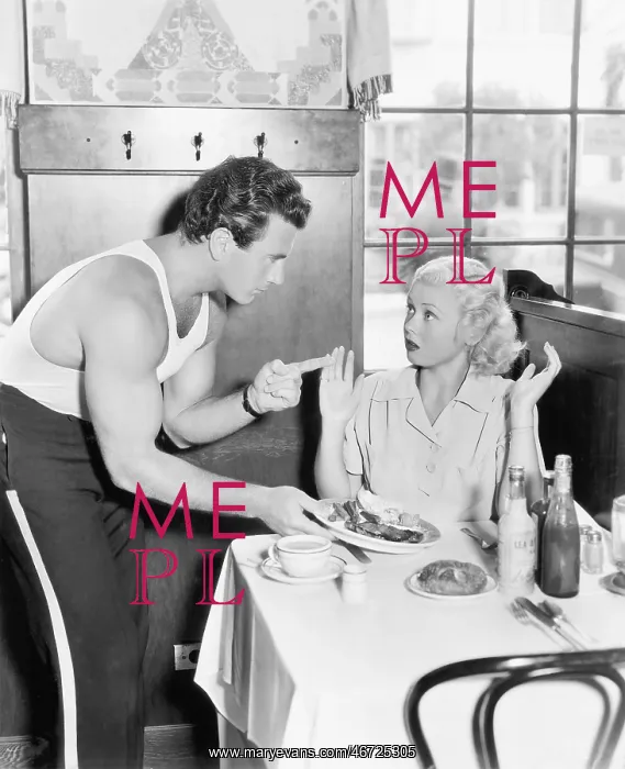: Couple in a restaurant having an argument over food : Couple in a restaurant having an argument over food
