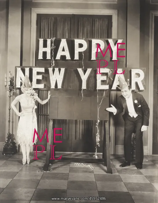 : Couple ringing in the New Year : Couple ringing in the New Year