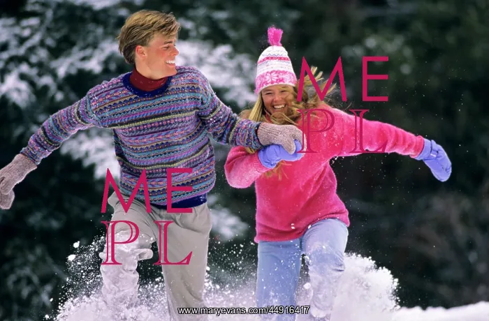  : Couple Running in Snow Vail Colorado