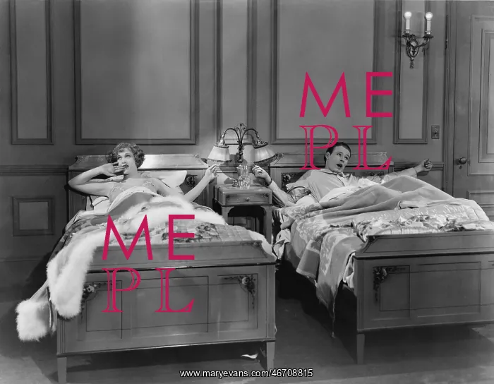 : Couple in separate beds : Couple in separate beds