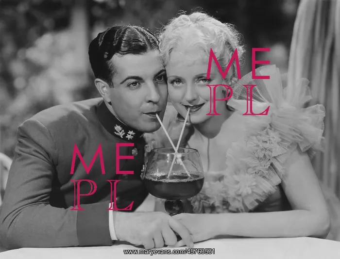 : Couple sharing a drink : Couple sharing a drink