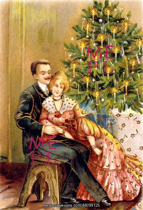 : Couple sitting by a Christmas tree