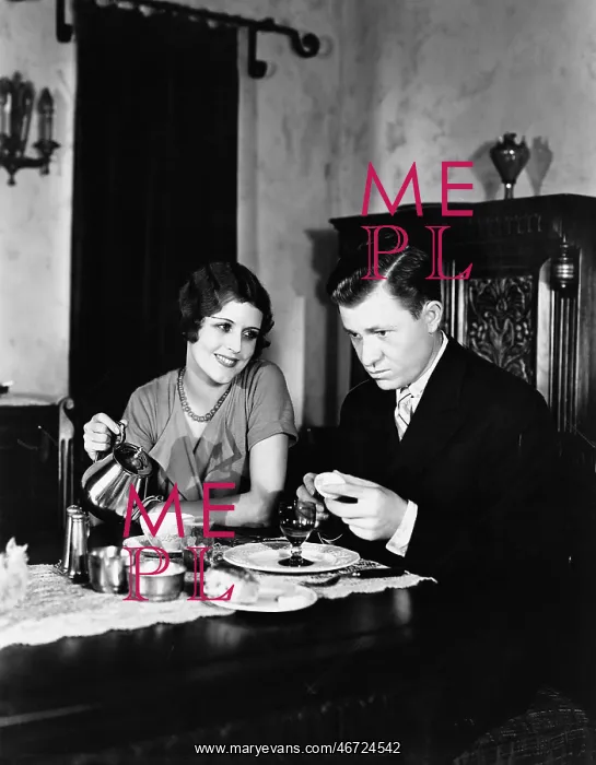 : Couple sitting together having tea : Couple sitting together having tea