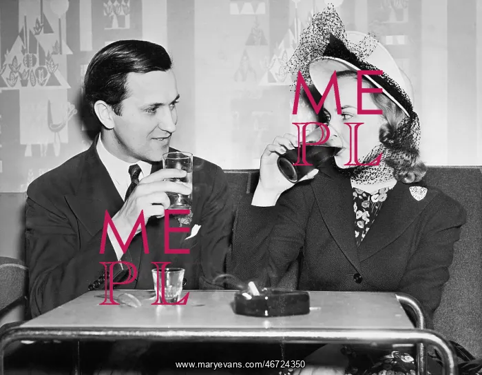 : Couple sitting together in a restaurant flirting : Couple sitting together in a restaurant flirting