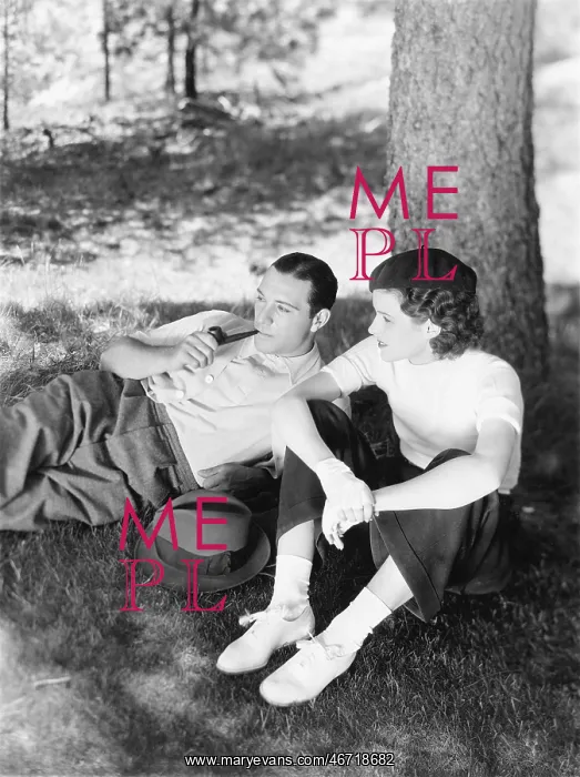 : Couple sitting under a tree