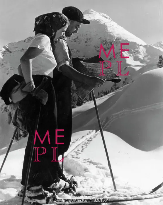: Couple skiing in the mountains : Couple skiing in the mountains