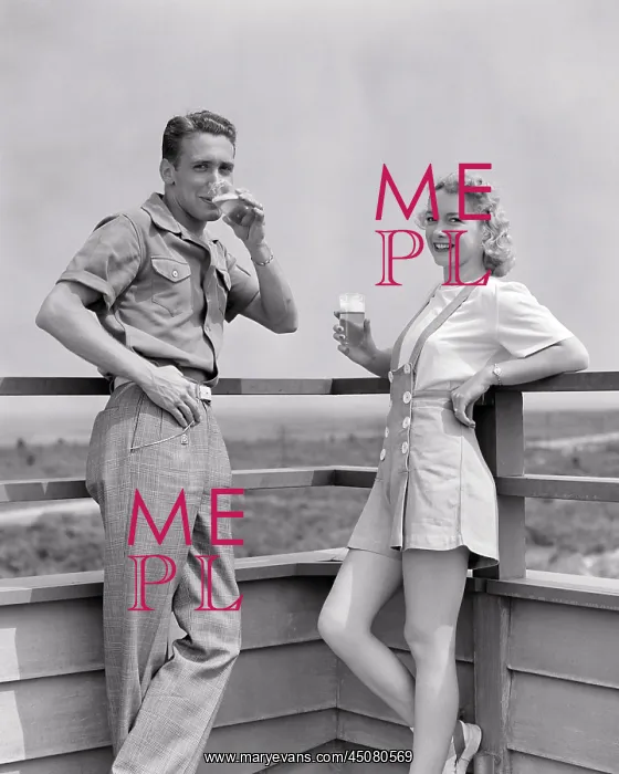 : Couple Standing on Deck of Beach House : Couple Standing on Deck of Beach House