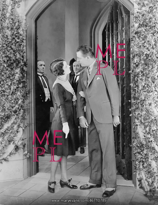 : Couple standing in front of a door and having a fight : Couple standing in front of a door and having a fight