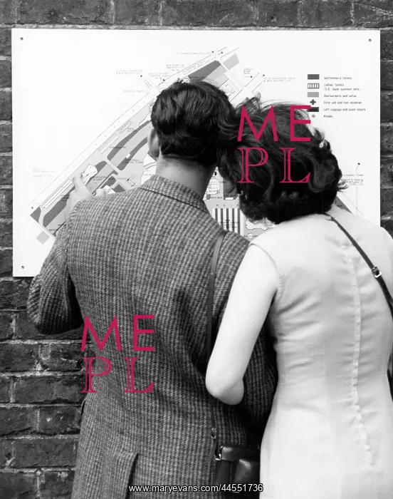 : COUPLE STUDYING A MAP : COUPLE STUDYING A MAP