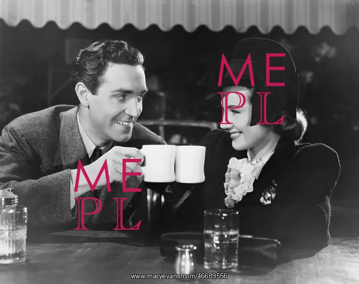 : Couple toasting with mugs : Couple toasting with mugs