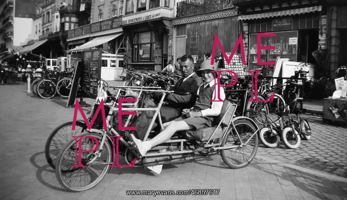 : Couple on a two-seater cycle, Belgium : Couple on a two-seater cycle, Belgium