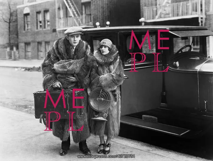 : Couple wearing fur coats : Couple wearing fur coats