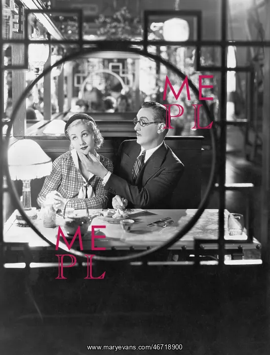 : Couple through window in restaurant : Couple through window in restaurant