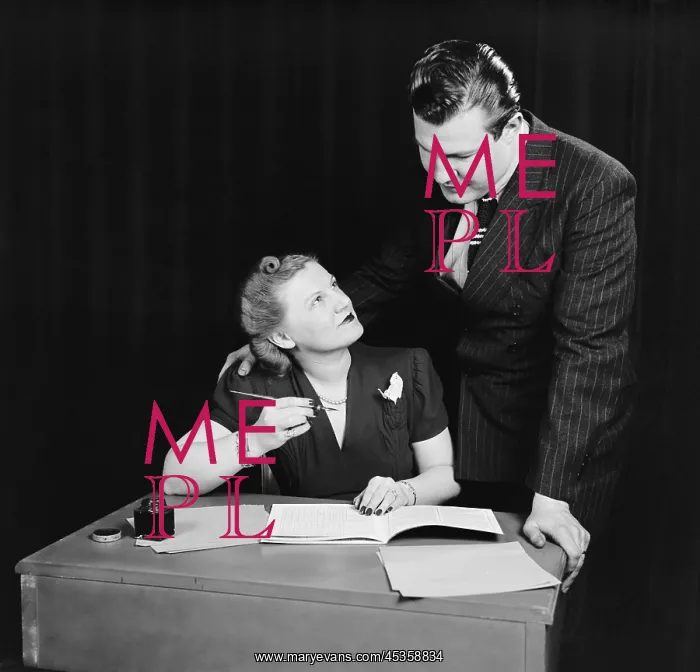 : Couple working out budget, ca. 1940. This is an : Couple working out budget, ca. 1940. This is an