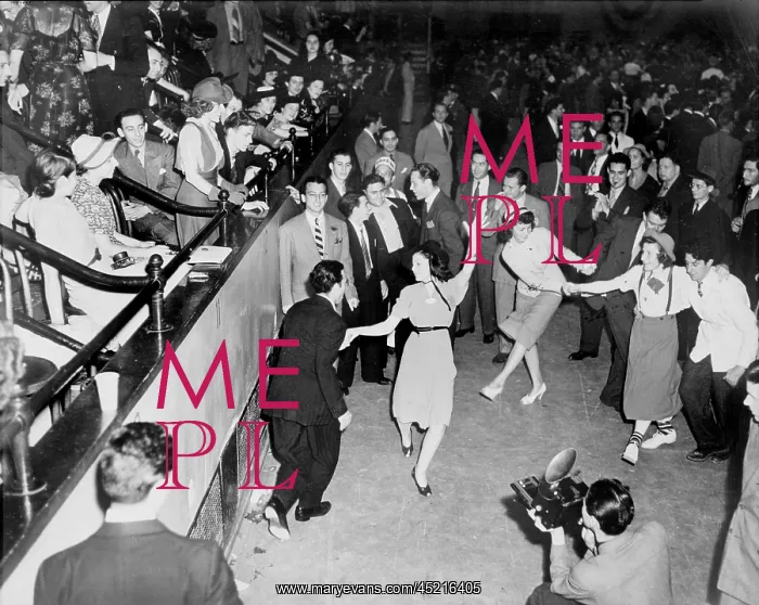 : Couples jitterbug dancing on a dance floor, ? : Couples jitterbug dancing on a dance floor, ?