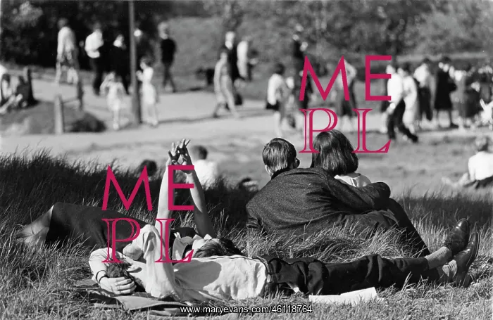 : Two couples in a park on a sunny day : Two couples in a park on a sunny day