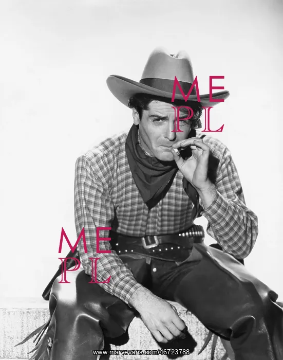 : Cowboy with a cowboy hat smoking a cigarette : Cowboy with a cowboy hat smoking a cigarette