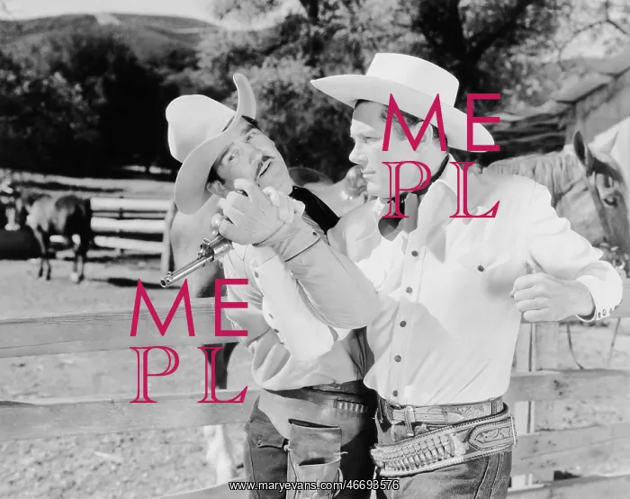  : Two cowboys fighting with each other