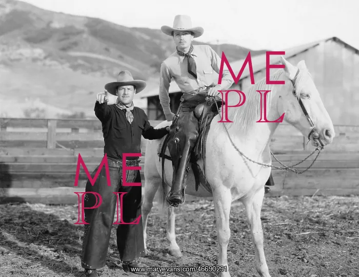: Two cowboys and a white horse : Two cowboys and a white horse