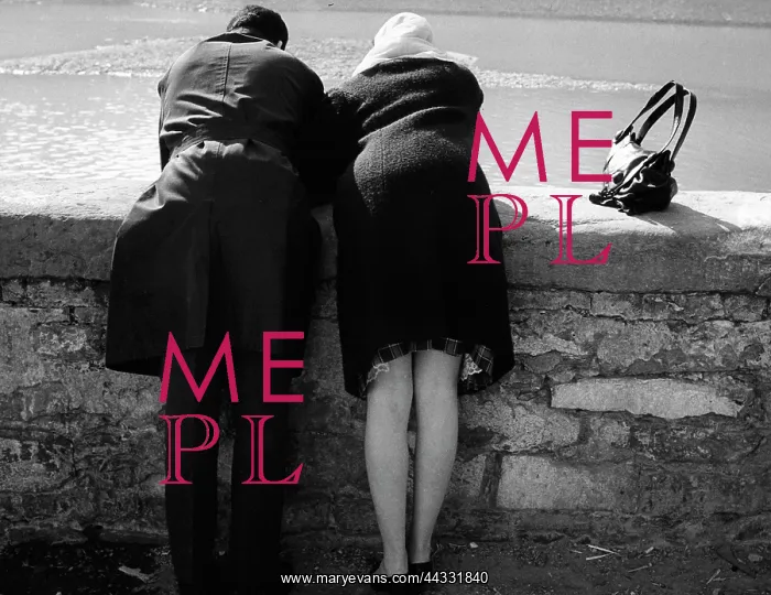 : Creative. Couple leaning on a parapet : Creative. Couple leaning on a parapet