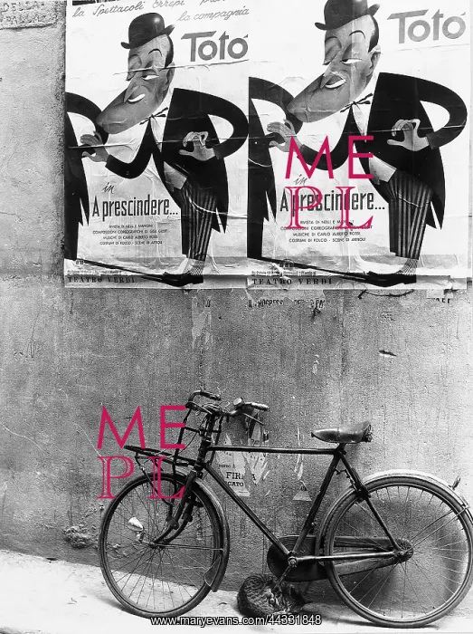 : Creative. A bicycle leaning against a wall in which some theatre posters : Creative. A bicycle leaning against a wall in which some theatre posters