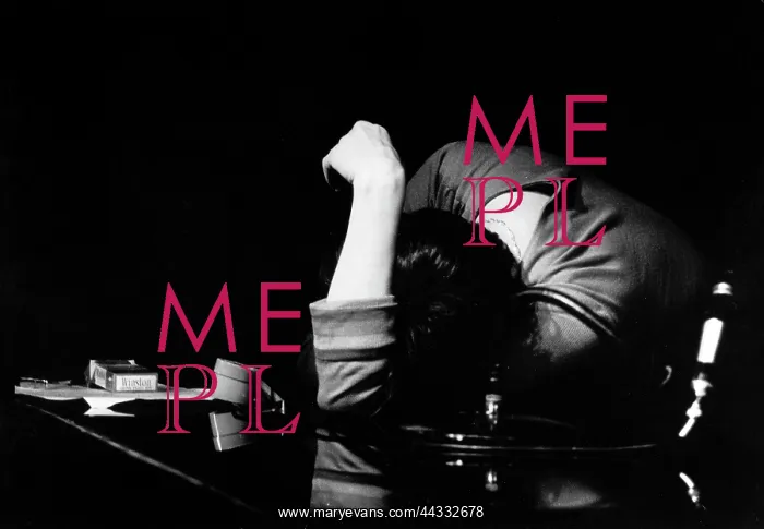 : Creative. Woman slumped over a table : Creative. Woman slumped over a table