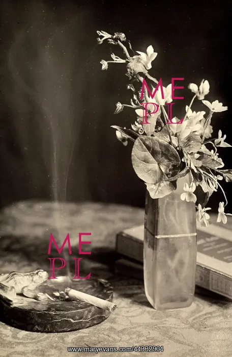 : Creative. A vase of cyclamens and a lit cigarette on an original stone : Creative. A vase of cyclamens and a lit cigarette on an original stone