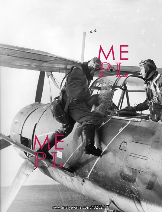 : The crew of a Hs 126 gets into the engine, 1939 : The crew of a Hs 126 gets into the engine, 1939