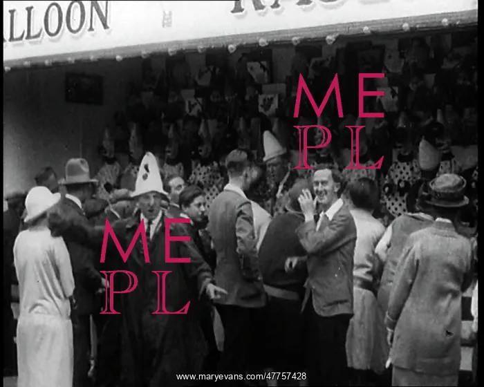 : A Crowd of People Standing In Front of a Carnival : A Crowd of People Standing In Front of a Carnival