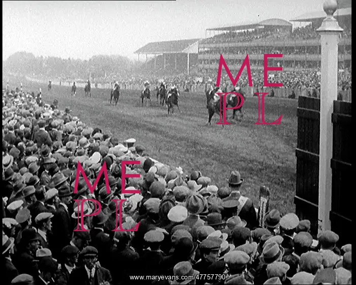 : A Crowd of People Watching Horses Racing at : A Crowd of People Watching Horses Racing at