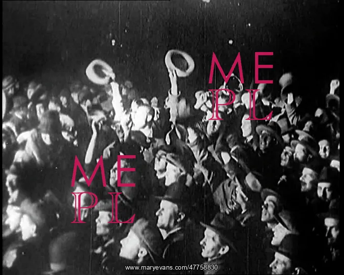 : A Crowd of People Wave at a Spotlight Which : A Crowd of People Wave at a Spotlight Which