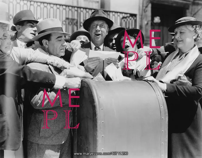 : Crowd trying to use postbox with winning number : Crowd trying to use postbox with winning number