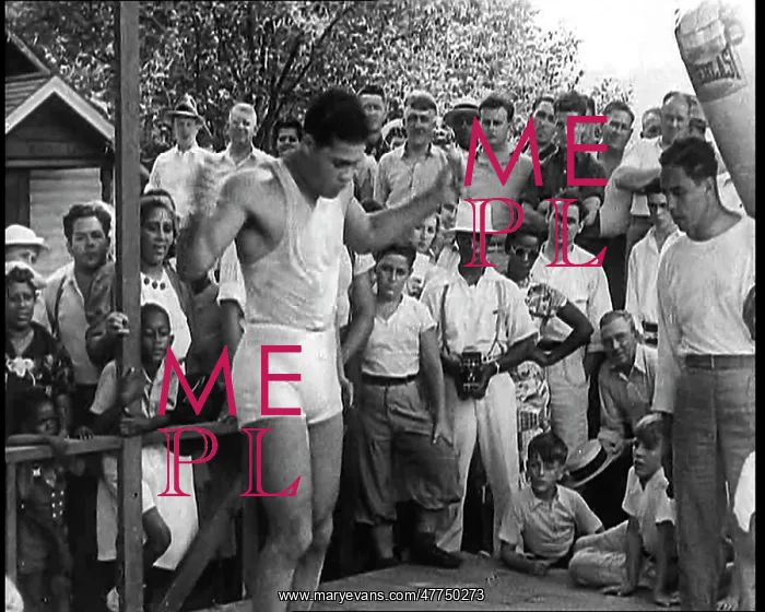 : Crowd Watching Joe Louis Training With a Skipping Rope : Crowd Watching Joe Louis Training With a Skipping Rope