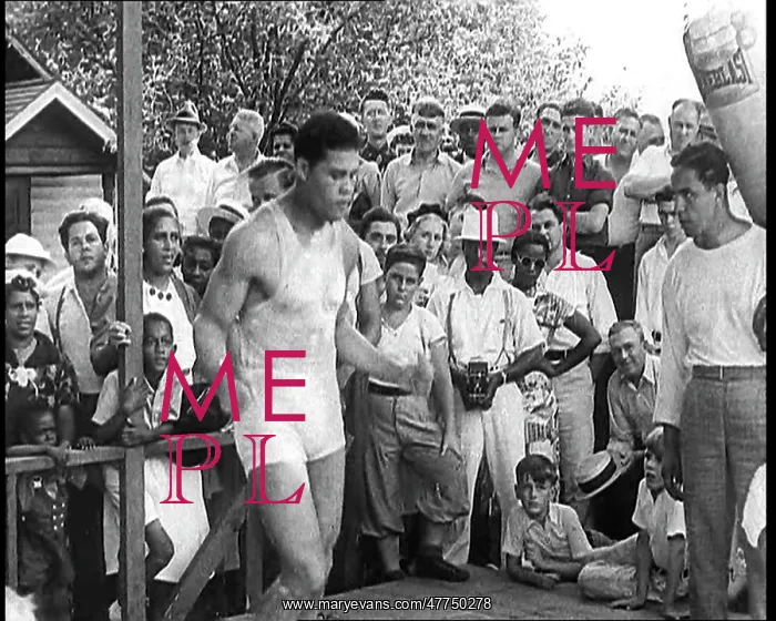 : Crowd Watching Joe Louis Training With a Skipping Rope : Crowd Watching Joe Louis Training With a Skipping Rope