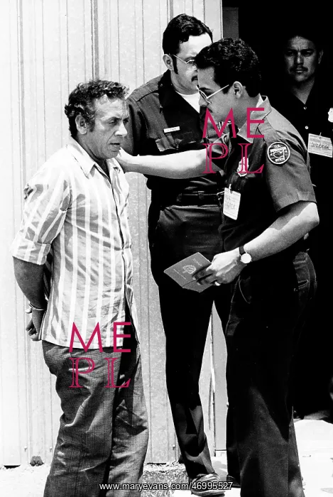 : Cuban refugee under arrest : Cuban refugee under arrest