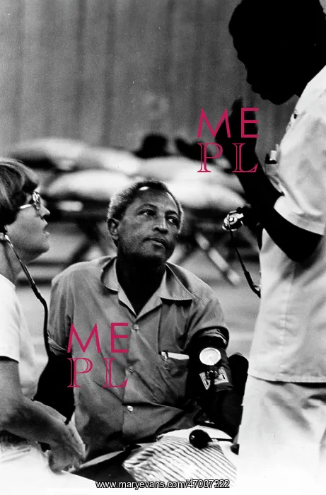 : Cuban refugee gets blood pressure checked : Cuban refugee gets blood pressure checked