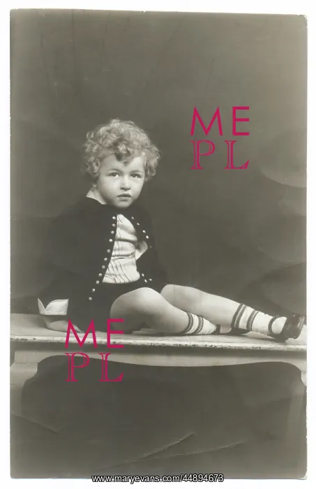 : Curly haired boy in photographer's studio : Curly haired boy in photographer's studio