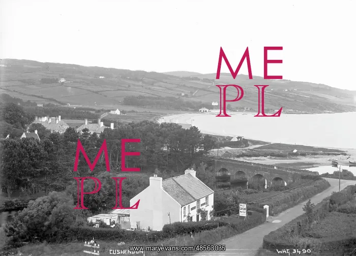 : Cushendun - an elevated view looking down on the village and stone bridge and bay : Cushendun - an elevated view looking down on the village and stone bridge and bay