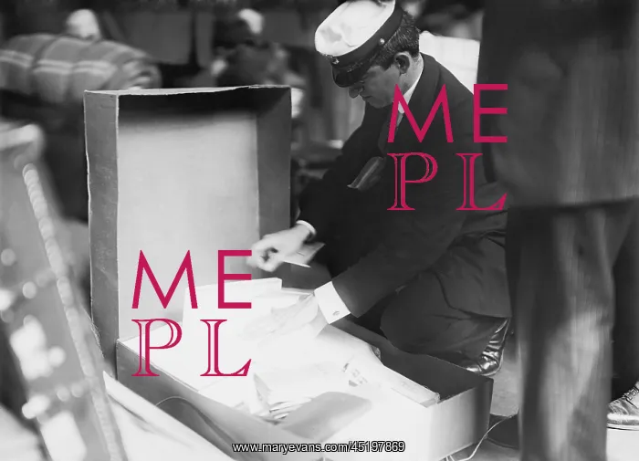 : Customs officer inspecting luggage of a ? : Customs officer inspecting luggage of a ?