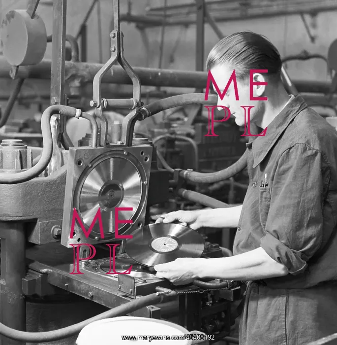 : Czechoslovakia - 1948. Worker at LP record press : Czechoslovakia - 1948. Worker at LP record press