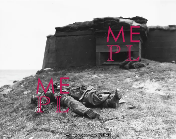: D-Day - Dead German soldier by pillbox : D-Day - Dead German soldier by pillbox